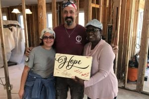 2018-US-Wilmington-NC-Hurricane-Florence-Muck-out-Volunteers-IOCC-logo-branding-HOPE-1024x610